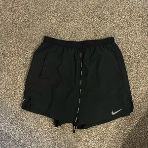 Men’s Nike running shorts with liner.